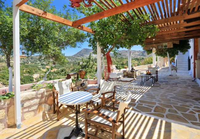 Amazing villa,13 persons,Almyrida,Chania,Shaded pergola with tea table Amazing villa,13 persons,Almyrida,Chania,Shaded pergola with tea table