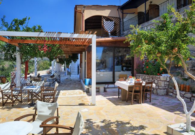 Amazing villa,13 persons,Almyrida,Chania,Terrace with exterior furniture Amazing villa,13 persons,Almyrida,Chania,Shaded pergola and exterior furniture