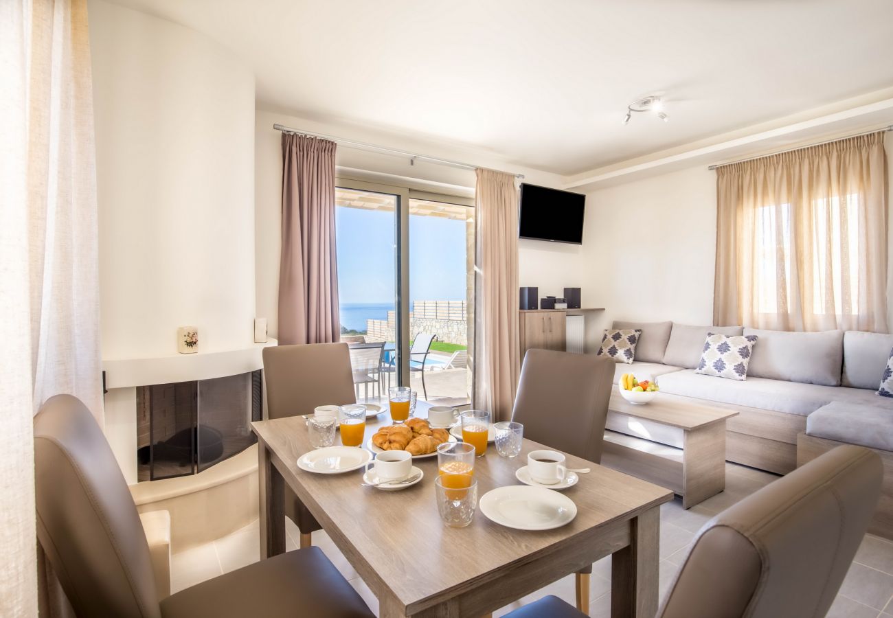 Villa with sea views,Triopetra,Rethymno,The living area and dining table Villa with sea views,Triopetra,Rethymno,The living area and dining table