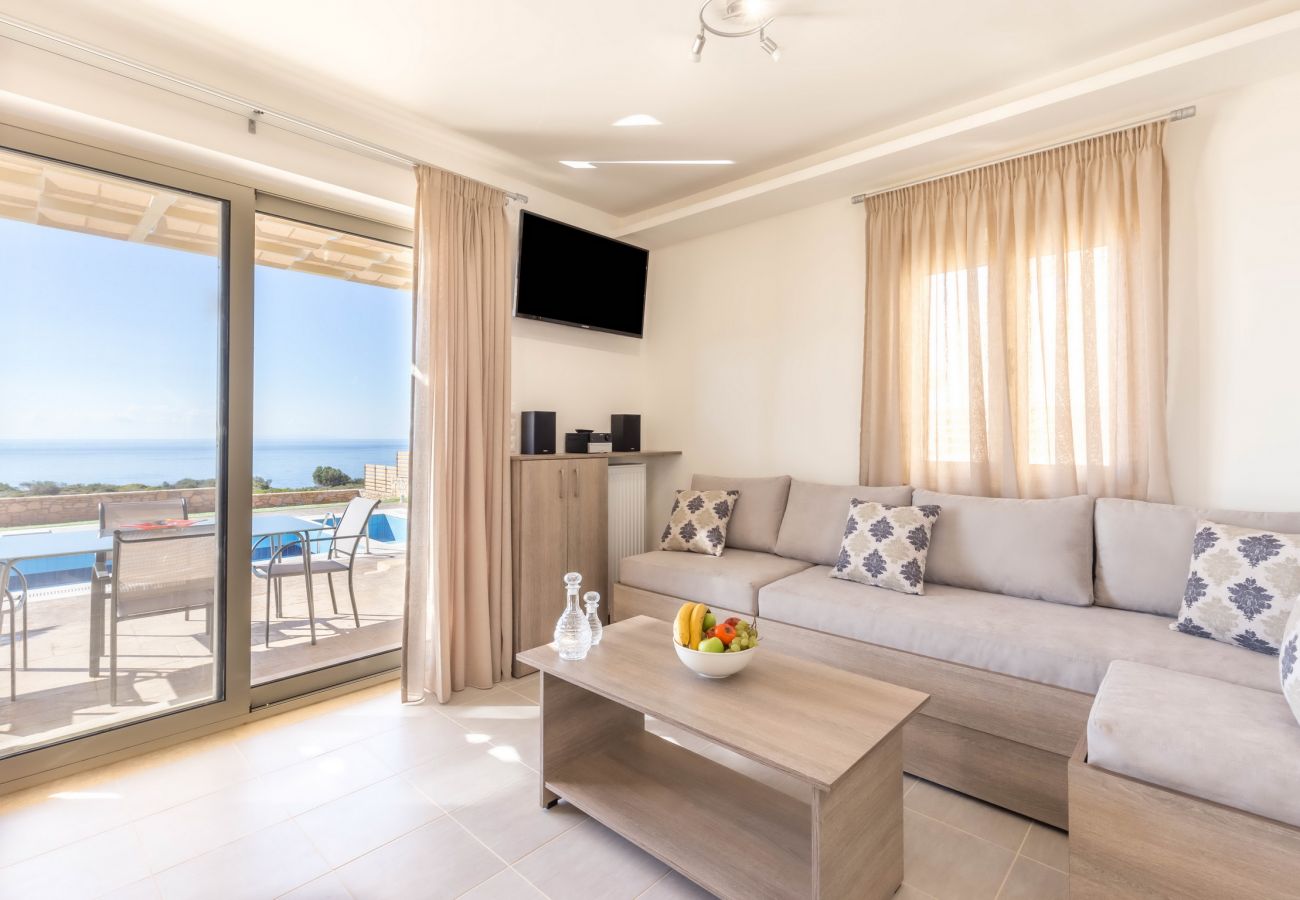 Villa with sea views,Triopetra,Rethymno,Living room with swimming pool view Villa with sea views,Triopetra,Rethymno,Living room with swimming pool view