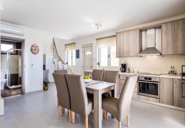 Fully equipped kitchen and dining table,Triopetra,Rethymno Fully equipped kitchen and dining table