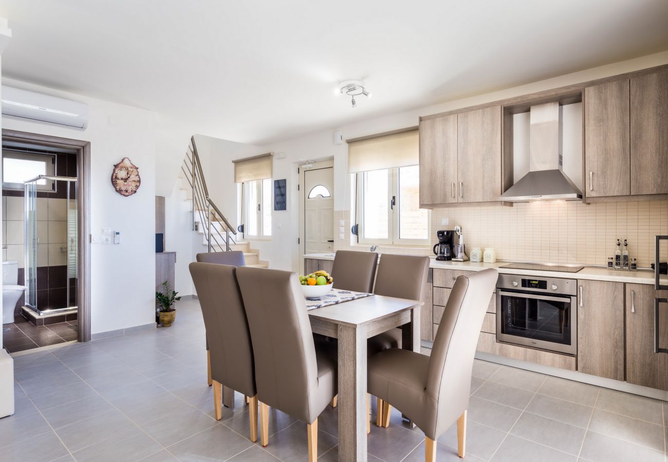 Fully equipped kitchen and dining table,Triopetra,Rethymno Fully equipped kitchen and dining table