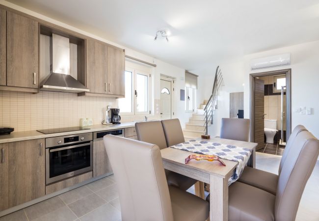 Fully equipped kitchen and dining table,Triopetra,Rethymno Fully equipped kitchen and dining table
