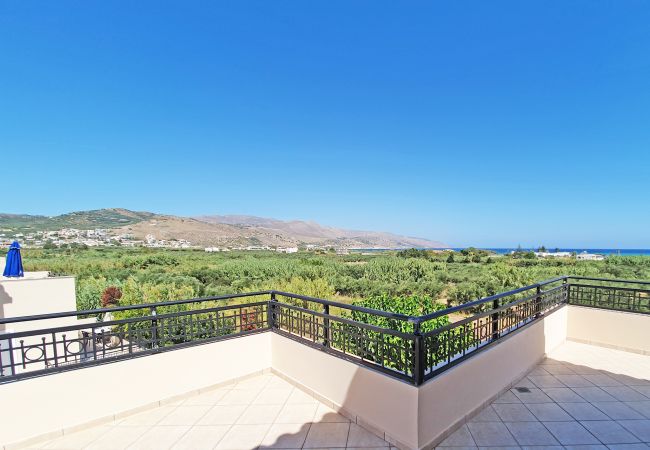 Villa in Walking distance to the beach, Near tavern, Chania, Crete Sea and grove view from the balcony of the villa in Walking distance to the beach, Near tavern, Chania, Crete