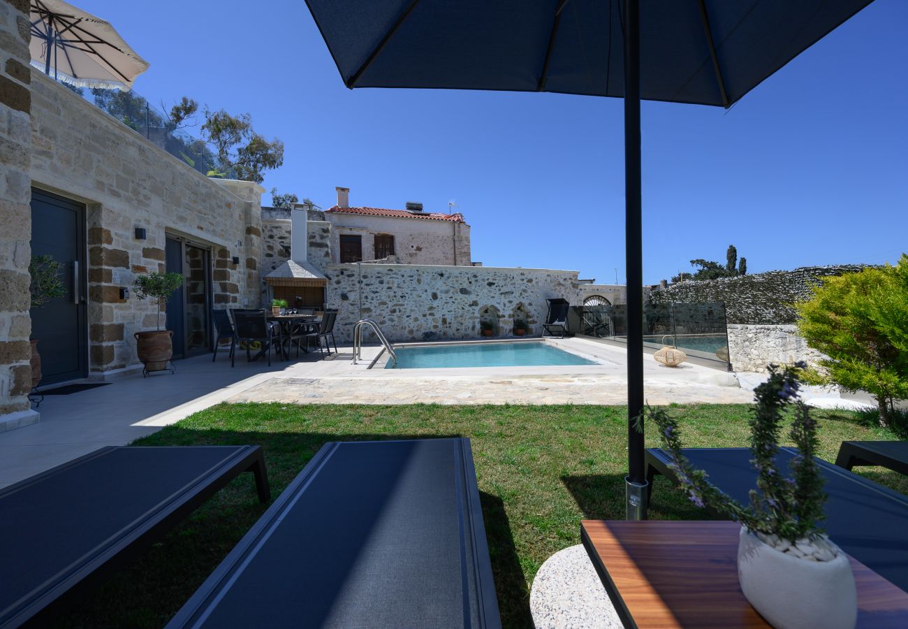 Garden and Pool area in Stone Project villa in Pigi, Rethymno Garden and Pool area in Stone Project villa in Pigi, Rethymno