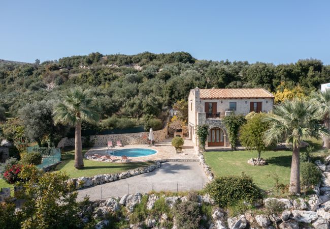 Hilltop villa exterior view, swimming pool